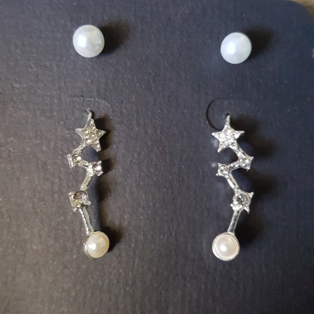 Faux pearl and rhinestone earrings.